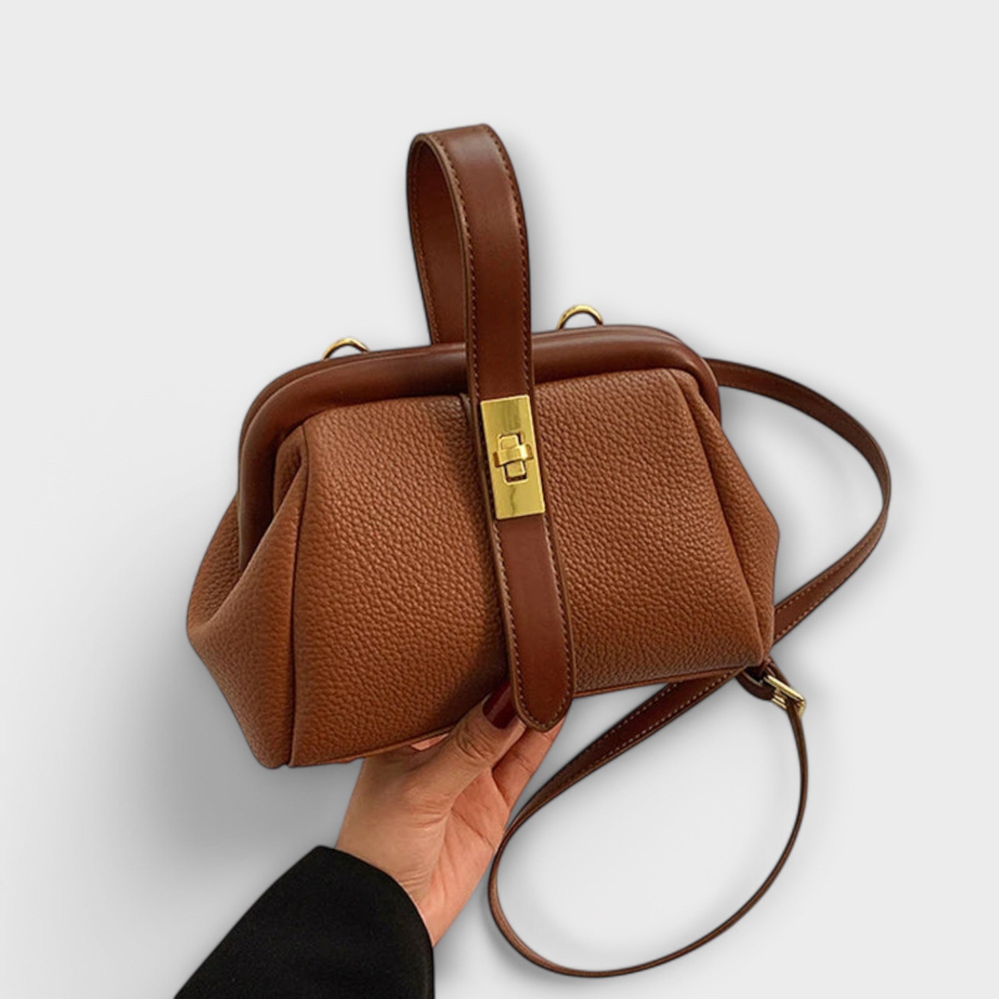 Geantă de mână sau crossbody damă Angie, elegantă și practică într-o nuanță de maro.